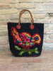 Borsa piccola in lana annodata nera con uccellino Natalie Lete Po! Paris | M11 Shop